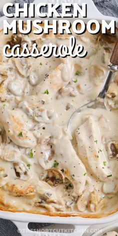 chicken mushroom casserole in a white dish with a wooden spoon on the side