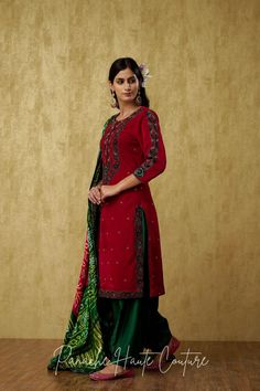 Introducing our Stunning Dark Emerald Green and Red Punjabi Suit Set, a mesmerizing outfit that will leave everyone awestruck. The kameez is made of luxurious red velvet, which gives it a regal and rich look. The dark emerald green embroidery on the kameez adds a touch of elegance and sophistication to the overall design. The salwar is made of plain silk in a green color that complements the kameez beautifully. The green monotone embroidery on the salwar adds a subtle yet stylish touch to the ou Emerald Green Nails Design, Red Punjabi Suit, Dark Emerald Green Nails, Monotone Embroidery, Nails Design Square, Emerald Green Nails, Dark Emerald Green, Curated Outfit, Green Embroidery