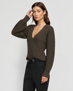 A luxe shape-holding thick ribbed knit sweater, featuring a flattering V-neck and subtle bell sleeves. Sanne is an effortlessly chic no-brainer for cooler months. See below for our general Size Guide and available measurements Made of 50% organic cotton and 50% merino wool Hand wash cold and lay flat to dry Ribbed Knit Sweater, Green Sweater, Vneck Sweater, Capsule Wardrobe, Bell Sleeves, Merino Wool, Sweaters & Cardigans, Ribbed Knit, Ottoman