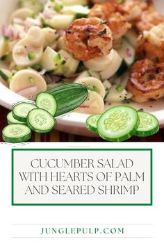 cucumber salad with hearts of palm and seared shrimp in a white bowl