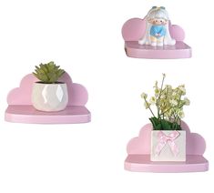 three pink shelves with white vases and flowers in them