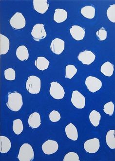 a painting with white dots on a blue background