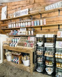 a store filled with lots of different types of food and drink on shelves next to each other