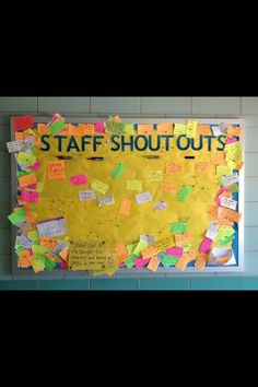 a bulletin board covered in sticky notes and post - it notes that read staff shots