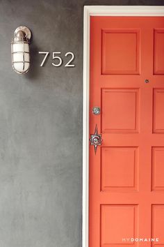 an orange door with the number 752 on it