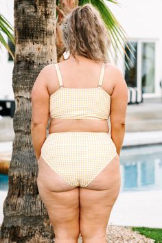 Feel just fine and sandy in this super chic swim top! We love the gingham pattern and figure flattering design! Throw on some cute sandals and accessories for your next beach or pool day. Simply pair this swim top with the matching bottoms for the perfect look! Gingham Swimwear For Sunbathing During Beach Season, Gingham Swimwear With Adjustable Straps For Poolside, Poolside Gingham Swimwear With Adjustable Straps, Vacation Gingham Swimwear With Adjustable Straps, Gingham Swimwear For Sunbathing In Spring, Spring Gingham Swimwear For Sunbathing, Gingham Swimwear For Sunbathing, Gingham Swimwear For Beach Season Sunbathing, Gingham Triangle Top Swimwear For Beach Season