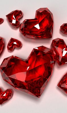 many red diamonds are arranged in the shape of hearts