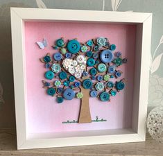 a white frame with buttons in the shape of a tree