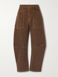 Find NILI LOTAN Shon Cotton-blend Corduroy Tapered Pants on Editorialist. Nili Lotan's 'Shon' pants are a utilitarian staple. Cut from cotton-blend corduroy, they have elongated cargo pockets and pleated knees for a curved, tapered silhouette. Wear yours at the weekend with a tucked-in tee or sweater. Vintners Daughter, Nili Lotan, Tapered Pants, Lingerie Sleepwear, Denim Top, Jeans Dress, Women Collection, Playsuit Jumpsuit, The Weekend