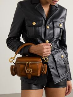 This small version of Chloé's 'Camera' bag is a cool re-interpretation of practical vintage styles. Made from leather, it has plenty of outer pockets that create its distinct shape and features polished gold-tone hardware, including a buckled strap. Carry it by the detachable top handle or adjustable cross-body strap, and stow your cardholder, keys and a few cosmetics inside. Exclusive Dress, Raffia Bag, Mini Robes, Boot Pumps, Chloe Bag, Small Shoulder Bag, Ski Wear, Summer Hats, Clothes Collection