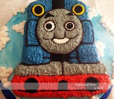 a thomas the train cake is on display