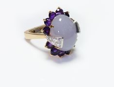 La Triomphe Jade Ring.Vintage La Triomphe ring with lavender purple jade, amethyst and diamond in 18K yellow gold. Signed La Triomphe. Size 7. Purple Jade, Genuine Love, Jade Ring, 18k Gold Ring, Lavender Purple, Ring Vintage, Gold Ring, Sapphire Ring, Antique Jewelry