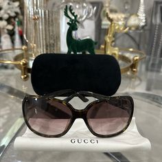 Authentic Sunglasses In Brown Color. These Glasses Are In Really Good Condition. No Visible Scratches On Lense. There Some Light Hair Line Scratches On The Arms. The Design With The Gucci Emblem And The Rhinestones Are All In Tact. No Missing Stones. The Lenses Size Is Medium. Color Brown. Made In Italy Gg3144/F/S Designer Gucci Sunglasses For The Beach, Designer Gucci Sunglasses For Beach, Designer Sunglasses With Gradient Lenses For Beach, Designer Sunglasses With Gradient Lenses For The Beach, Hair Line, Brown Sunglasses, Gucci Accessories, Light Hair, Colored Sunglasses