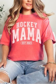 Hey hockey mamas! If you're on the hunt for a special way to show your team spirit on game day, look no further. Our personalized Hockey Mama shirt is a game-changer. Add your kiddo's LAST NAME, TEAM NAME, SCHOOL NAME, or EST YEAR, making you the ultimate fan in the stands. Hockey Shirts, Hockey Mom Gifts, Hockey Tshirt Design, Hockey Mom Custom Shirt, Hockey Mama, Custom Hockey Shirts Mom, Hockey Mom Shirts, Hockey Mom Outfits, Hockey Mom Must Haves, Hockey Tournament Outfits Collegiate Tops With Lettering For Game Day, Team Spirit Tops With Lettering For Game Day, Game Day Team-colored T-shirt With Lettering, Game Day Fan Apparel Top With Lettering, Team-colored T-shirt With Lettering For Game Day, Fan Apparel Tops With Lettering For Game Day, Casual Tops With Lettering For Fan Gear, Casual Tops With Fan Gear Lettering, Sports Season Fan Apparel T-shirt With Lettering