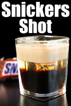 A square shot glass filled with a snickers shot that has three distinct layers. Alcoholic Desserts, Dessert Shots, Liquor Recipes, Yummy Alcoholic Drinks, Mixed Drinks Alcohol, Liquor Drinks