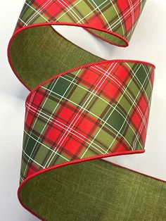 two green and red plaid ribbon on white background