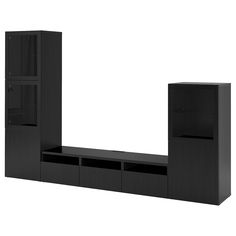 a black entertainment center with shelves and doors on each side, in front of a white background