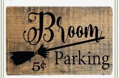 a wooden sign that says broom parking 5 cents