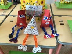 some very cute little paper bags on a table