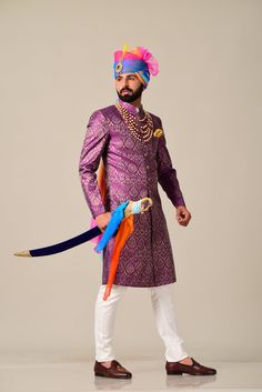 "Important Instrucitons : We request you to kindly calculate the processing time of your order after the mutual confirmation on Bespoke measurements between us has taken place (either via message , e mail or form) \"Crafted with Passion in India; loved by men across the USA, Canada, Europe\" Product Specifications : Material: Jaccard Cotton for Jam Purple Sherwani Color: Jam Purple with petal work Collar type: Mandarin , Sherwani with 7 Buttons Package contents: 1 Achkan + 1 Churidar Pajama Wash Purple Sherwani, Wedding Dulhan Pose, Churidar Pajama, Couple Photography Winter, Purple Color Combinations, Sherwani For Men Wedding, Indian Bride Photography Poses, Indian Bride Makeup, Groom Dress Men