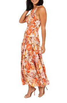 A wildly beautiful floral print heightens the vacation-ready allure of this one-shoulder sundress styled with a low two-tiered skirt with gathered detail. Hidden side-zip closure One-shoulder neck Partially lined 100% rayon Hand wash, dry flat Imported Summer Strapless Printed Maxi Dress, Strapless Printed Maxi Dress For Summer, Casual Strapless Dress For Poolside, Strapless Floral Print Sundress For The Beach, Strapless Sundress With Floral Print For Beach, Strapless Summer Dress For Poolside, Beach Floral Print Tiered Sundress, Tiered Floral Print Sundress For Beach, Beach Sundress With Floral Print And Tiered Shape