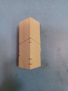 a piece of cardboard that has been cut in half