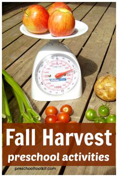 an image of fall harvest activities with apples and vegetables on a scale over wooden table