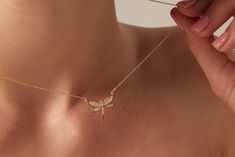 "Elevate your style with the enchanting beauty of our 14k Solid Gold Dragonfly Necklace. Crafted with meticulous artistry, this necklace features a delicate dragonfly pendant suspended from a radiant gold chain, infusing your look with a touch of nature's elegance. Whether you're searching for a thoughtful gift for her or a meaningful gesture for your girlfriend, this necklace captures the essence of grace and transformation. The dragonfly, symbolizing change and adaptability, adds a layer of significance to this stunning accessory. With its timeless charm and versatile design, this pendant necklace is the perfect way to express your appreciation and affection. D E T A I L E D - D E S C R I P T I O N: *Item : Necklace *Metal : 14k Solid Gold *Choice of Gold Color: Rose Gold / Gold / White Elegant Gold Dragonfly Jewelry, Yellow Gold Dragonfly Jewelry For Gifts, Yellow Gold Dragonfly Jewelry Gift, Elegant Gold Dragonfly Necklace, Elegant Dragonfly Jewelry For Wedding, Thoughtful Gifts For Her, Dragonfly Necklace, Dragonfly Pendant, Rose Gold Chain