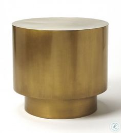 a gold and white round table on a white background with the top half turned down