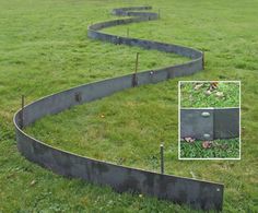 an image of a curved garden design in the middle of a field with green grass