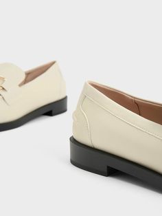 This product is made with at least 20% sustainable materials by weight. CHARLES & KEITH uses recycled, degradable, organic, and water-based materials in our eco-conscious collection. Classic with a twist, these loafers are made with recycled faux leather, making them great for the fashion-lover who is looking to make more thoughtful choices. Featuring a classic round-toed silhouette, low-blocked heels and a versatile chalk finish, these shoes will complement most outfits and elevate any look with the subtle shine of their gold-toned details. Blocked Heels, Leather Making, Faux Leather Heels, Size Chart For Kids, Charles Keith, Low Block Heels, Printables Kids, Eco Conscious, Sustainable Materials