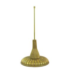 a gold colored lamp on a white background