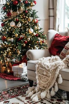 a living room with a christmas tree in the corner