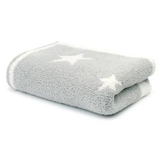 two grey towels with white stars on them