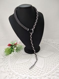 "A copy of a rare antique Turkish bead snake necklace from the 1910s-1920s. Necklace from Czech beads, crochet necklace, it is 100% handmade. Jewelry snake is super elastic and comfortable to wear. Replica Vintage snake with geometric pattern. The body is gray with black zigzags, the belly is white. The snake of the head slides through the loop to the tail. The necklace will emphasize your individuality, originality and uniqueness. It will be a great gift. The length of the snake necklace is 50 Black Beaded Lariat Necklace Gift, Vintage Beaded Lariat Jewelry, Unique Beaded Lariat Necklace, Adjustable Black Beaded Lariat Necklace, Adjustable Black Beads Lariat Beaded Necklaces, Vintage Lariat Beaded Necklaces For Gifts, Vintage Lariat Beaded Necklaces As Gift, Adjustable Lariat Beaded Necklace With Black Beads, Vintage Lariat Beaded Necklace As A Gift