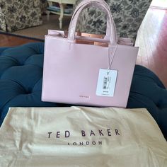 Ted Baker Handbag Brand New With Dust Bag. Smoke-Free Home. Blush Color With Rose Gold Accents. Ted Baker Bag Handbags, Chic Pink Satchel With Paper Bag Included, Feminine Shoulder Bag With Double Handle And Dust Bag, Pink Satchel Box Bag For Shopping, Everyday Pink Box Bag With Top Carry Handle, Pink Box Bag With Top Carry Handle For Gifts, Pink Top Handle Box Bag For Everyday, Everyday Pink Top Handle Box Bag, Pink Box Bag With Detachable Strap For Shopping