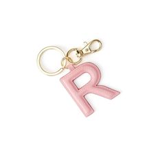 a pink keychain with the letter r on it's front and bottom