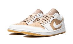 The Air Jordan 1 Low “Hemp/White” brings a clean, neutral look to the popular silhouette.  This sneaker features a light brown, or “Hemp,” with a leather base, coupled with white leather panels at the eyelets, toe box, and heel.  A Jordan Jumpman logo is found embroidered on the heel.  A white midsole and gum rubber outsole complete the shoe. Low Jordan 1, White Jordans, Low Shoes, Jumpman Logo, Air Jordan Sneakers, Designer Outlet, Stadium Goods, Air Jordan 1 Low, Jordan 1 Low