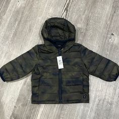 Baby Gap Coldcontrol Lightweight Puffer Jacket Green Camo Quilted Water-Resistant Outer. Full Front Zip Closure W/ Hood Front Slant Pockets Long Sleeves With Banded Cuffs Nwt- Shipping From A Smoke And Pet Free Home Green Outerwear For Playtime In Fall, Green Fall Outerwear For Playtime, Casual Green Outerwear For Playtime, Green Spring Outerwear For Playtime, Green Long Sleeve Outerwear For Playtime, Gap Long Sleeve Outerwear For Playtime, Gap Outdoor Outerwear With Pockets, Camo Quilt, Lightweight Puffer Jacket