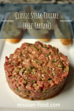 a steak tartare on a white plate with text overlay that reads classic steak tartare beef tartare