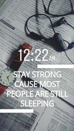 a clock and some books with the words stay strong cause most people are still sleeping