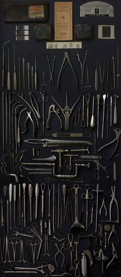 there are many different tools on the wall