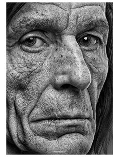 an old man with wrinkles on his face is shown in this black and white photo