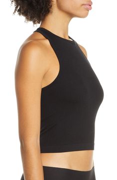 Lounge or layer in this oh-so-versatile ribbed crop top that looks (and feels) great wherever you go. 17" length (size Medium/Large) Crewneck Sleeveless Racerback 92% nylon, 8% spandex Machine wash, dry flat Imported Versatile Cropped Tops With Built-in Bra, Black Fitted Versatile Crop Top, Versatile Black Fitted Crop Top, Black Seamless Halter Top With High Stretch, Black Seamless High Stretch Halter Top, Ribbed Racerback Athleisure Crop Top, Black Crop Top With Medium Support And Seamless Construction, Versatile Scoop Neck Crop Top For Workout, Black Crop Top With Seamless Construction And Medium Support