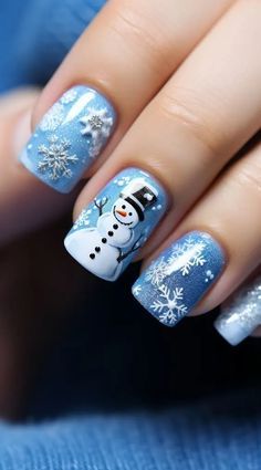 Christmas Nails Winter Wonderland, Icy Blue Winter Nail Designs, Blue Snowman Nails, Blue Xmas Nails Designs, Snow Man Nail Art, Snowman Nails Christmas, Snowmen Nail Designs, Christmas Gel Nail Art, Snow Nails Winter Blue