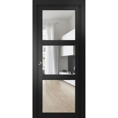 an open black door with glass panels