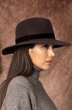 A velvet band encircles this wool fedora, enhancing its modern, chic attitude. 100% wool Spot clean Imported Chic Attitude, Brown Fedora, Sleek Dress, Dream Fashion, Wool Fedora, Felt Fedora, Bold Jewelry, Everyday Chic, Eugenia Kim