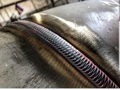 a close up view of some metal pipes