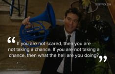 a man in a suit and tie holding a blue bullhorn with a quote on it that says, if you are not scared, then you are not afraid, then you are not taking a chance