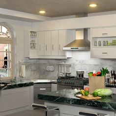 a kitchen with marble counter tops and white cabinets